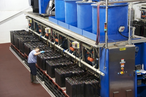 Acid recirculation systems use computerized vacuums to circulate acid through batteries, reducing heat for longer life. -Photo courtesy of Crown Battery Manufacturing, Inc.